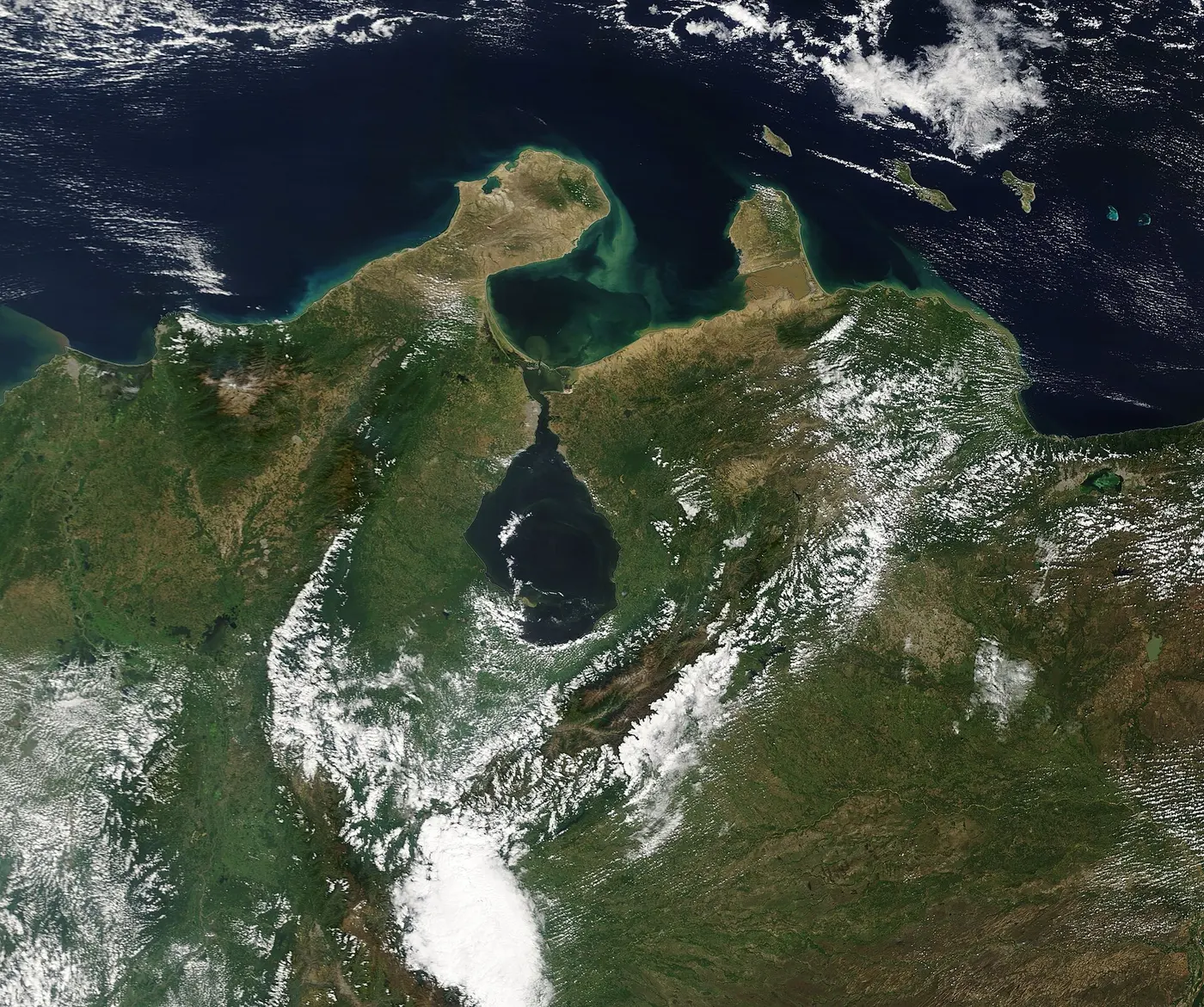 Northwestern Venezuela seen from a satellite: a large, dark lake set in green land, connected to the sea by a narrow channel to the north