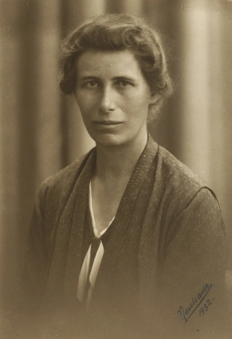 A sepia portrait photograph of Inge Lehmann from the waist up