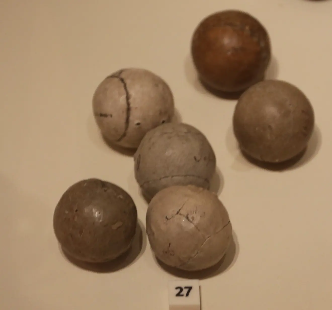 An old featherie golf ball made of sewn leather