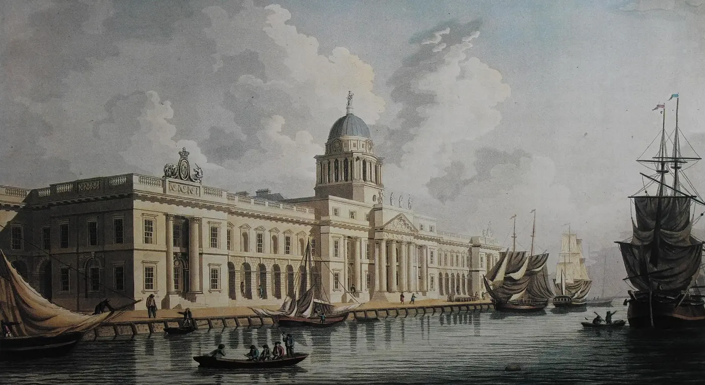 An old print of a long stone building topped by a dome, standing on a river with sailing ships