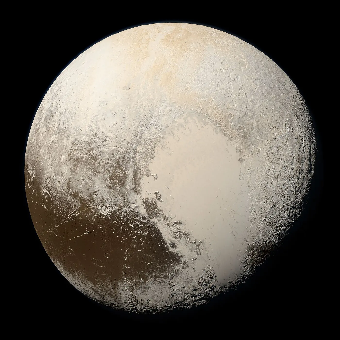 Pluto, with a pale cream and brown surface and a bright heart-shaped region